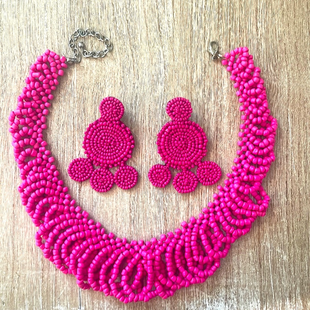 Pink beaded necklace with matching earrings. 17.5” long.
